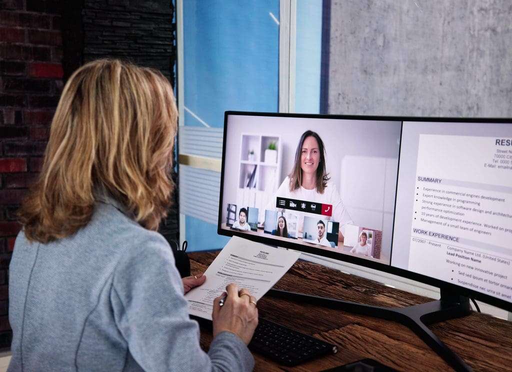 PEO Recruitment officer conducts online interview with applicant via video conferencing.