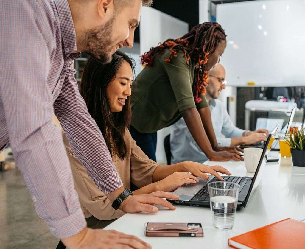 Retaining top talents - A group of young professionals having training in an office.